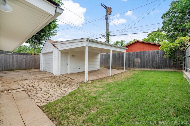 1212 S Knoxville Ave, Tulsa, OK 74112 - garage with driveway, fence, and a garage