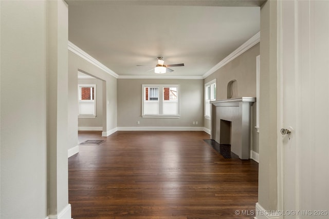 1212 S Knoxville Ave, Tulsa, OK 74112 - unfurnished living room featuring dark wood finished floors, baseboards, a ceiling fan, a fireplace with flush hearth, and crown molding