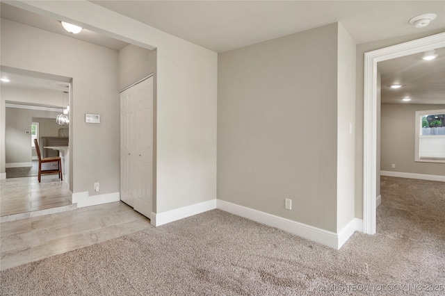1212 S Knoxville Ave, Tulsa, OK 74112 - spare room with light colored carpet and baseboards