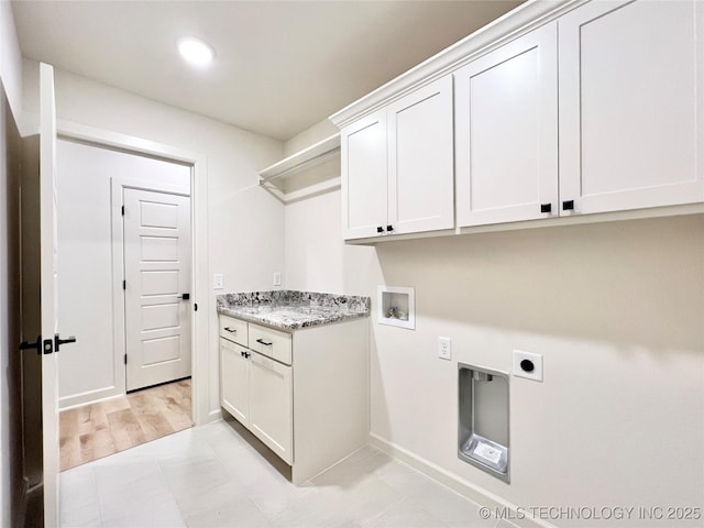laundry area featuring hookup for an electric dryer, washer hookup, baseboards, recessed lighting, and cabinet space