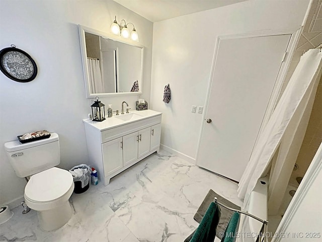 full bathroom featuring vanity, marble finish floor, curtained shower, toilet, and baseboards