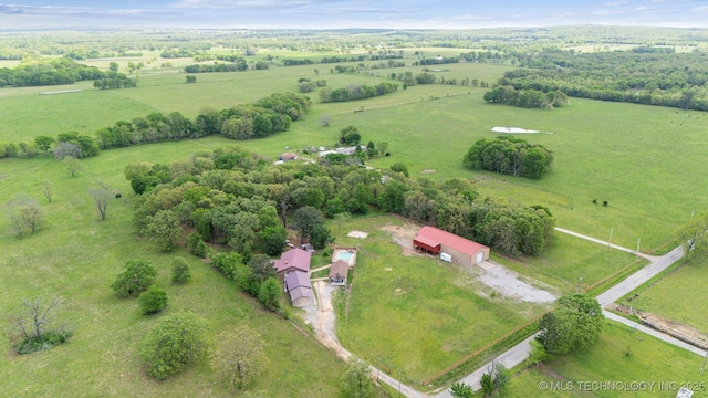 birds eye view of property featuring a rural view