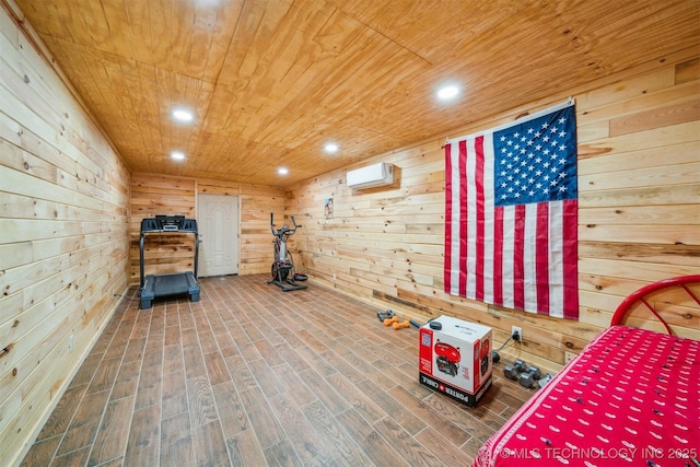 interior space featuring wood ceiling, wood finished floors, wooden walls, and a wall unit AC