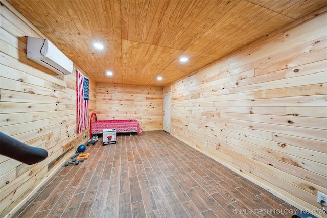interior space with recessed lighting, wood finished floors, wood ceiling, wood walls, and a wall unit AC