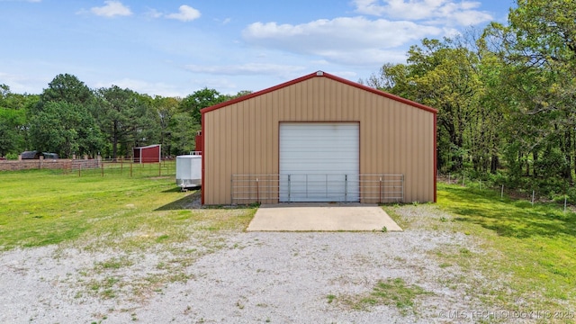 detached garage with fence