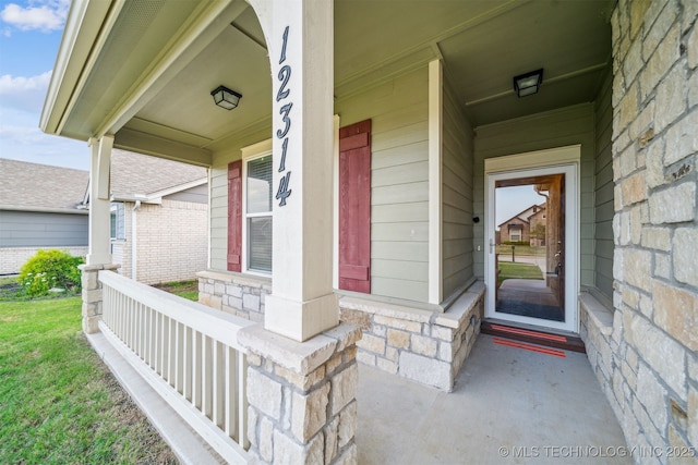 12314 N 131st E Ave, Collinsville, OK 74021 - entrance to property with a porch and stone siding