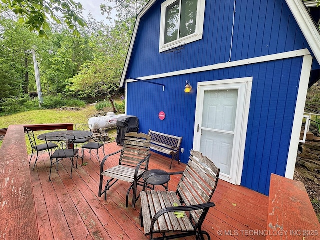 deck featuring outdoor dining space