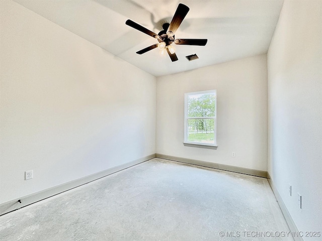 unfurnished room featuring baseboards, a ceiling fan, concrete floors, and visible vents