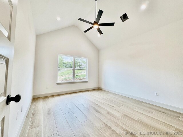 spare room with a ceiling fan, baseboards, recessed lighting, wood finished floors, and lofted ceiling