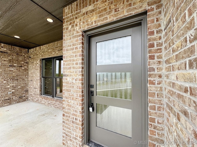 566 Woodlands Dr, Tahlequah, OK 74464 - property entrance with brick siding