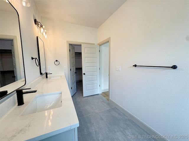 566 Woodlands Dr, Tahlequah, OK 74464 - full bathroom with double vanity and baseboards