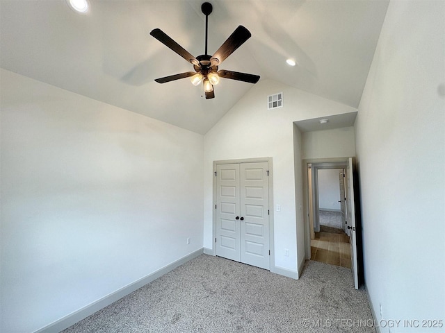 566 Woodlands Dr, Tahlequah, OK 74464 - unfurnished bedroom featuring carpet, baseboards, recessed lighting, a closet, and high vaulted ceiling