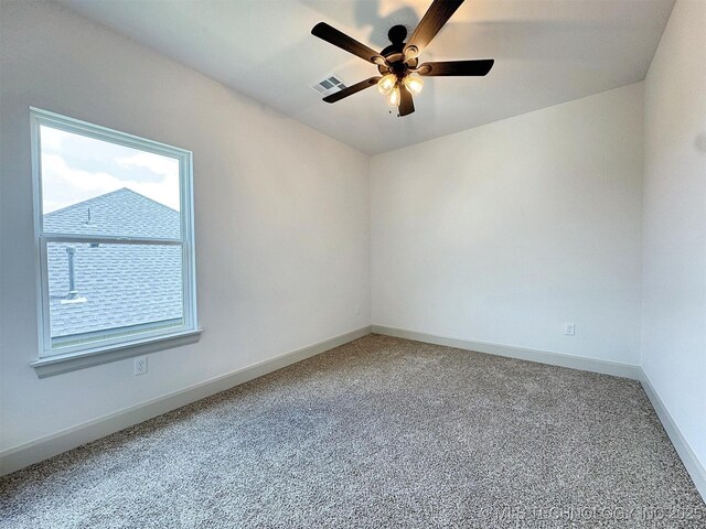 566 Woodlands Dr, Tahlequah, OK 74464 - spare room with ceiling fan, carpet flooring, and baseboards
