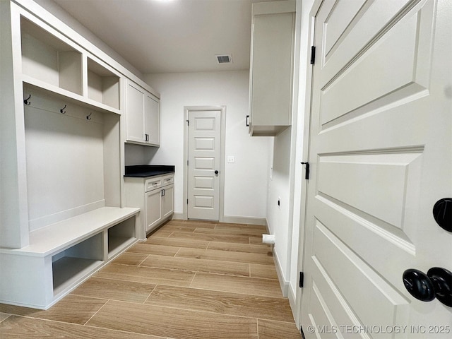 566 Woodlands Dr, Tahlequah, OK 74464 - mudroom with light wood finished floors and baseboards