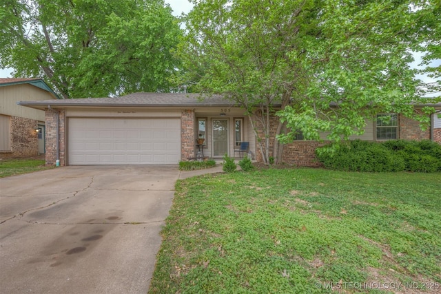 ranch-style home with concrete driveway, a front lawn, an attached garage, and brick siding