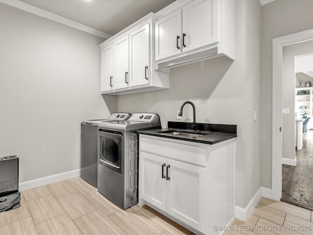 13651 S 26th St, Jenks, OK 74008 - clothes washing area featuring washer and clothes dryer, cabinet space, baseboards, and crown molding