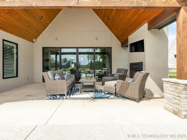 13651 S 26th St, Jenks, OK 74008 - view of patio / terrace featuring an outdoor living space with a fireplace
