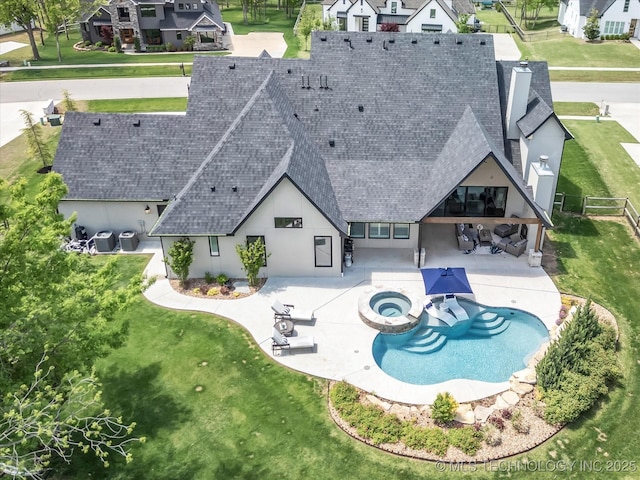 13651 S 26th St, Jenks, OK 74008 - view of pool with a patio, a pool with connected hot tub, and a residential view