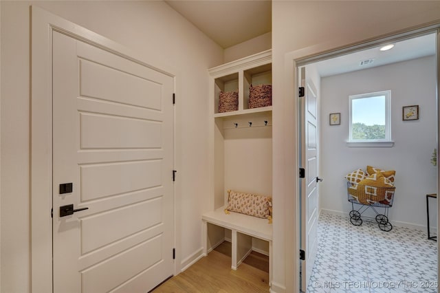 1500 N 72nd St, Broken Arrow, OK 74014 - mudroom with baseboards, visible vents, and light floors