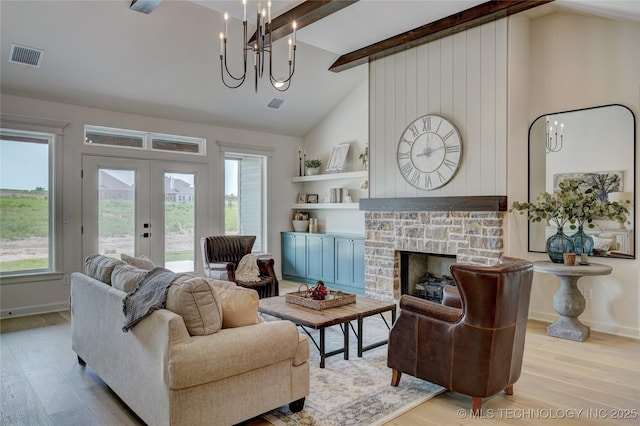1500 N 72nd St, Broken Arrow, OK 74014 - living room featuring beam ceiling, high vaulted ceiling, wood finished floors, visible vents, and french doors