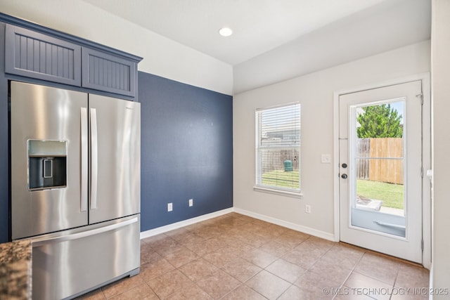 13323 S 21st St, Bixby, OK 74008 - kitchen with stainless steel fridge and light tile patterned floors