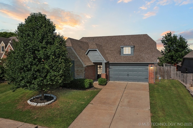 13323 S 21st St, Bixby, OK 74008 - view of front facade with brick siding, concrete driveway, roof with shingles, and a garage