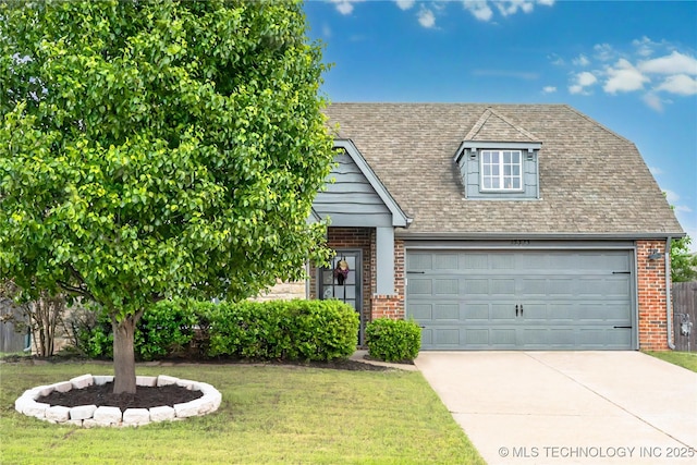 13323 S 21st St, Bixby, OK 74008 - view of front of property featuring brick siding, a front yard, driveway, and an attached garage