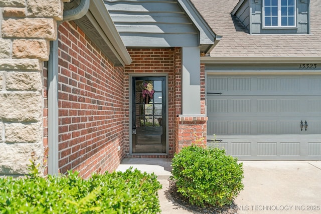 13323 S 21st St, Bixby, OK 74008 - entrance to property featuring brick siding and roof with shingles
