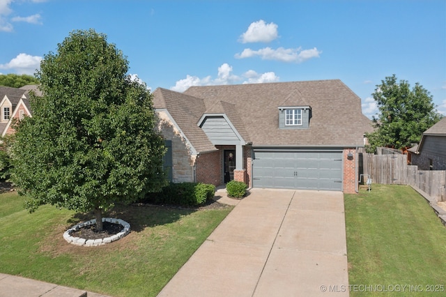 13323 S 21st St, Bixby, OK 74008 - view of front facade with driveway, brick siding, and a shingled roof