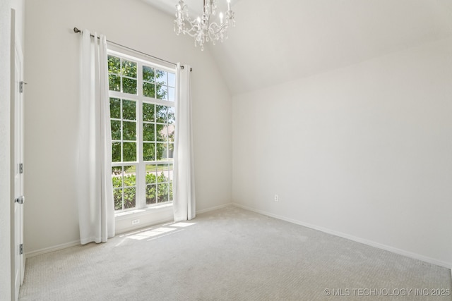 13323 S 21st St, Bixby, OK 74008 - carpeted spare room featuring a chandelier and lofted ceiling