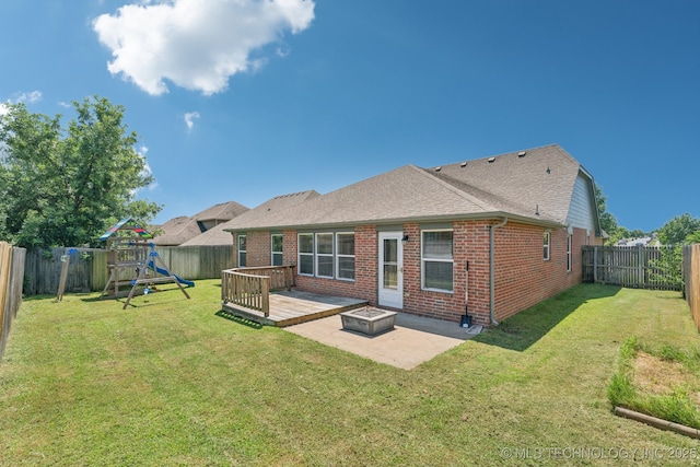 13323 S 21st St, Bixby, OK 74008 - back of house featuring brick siding, a deck, a fenced backyard, and a patio