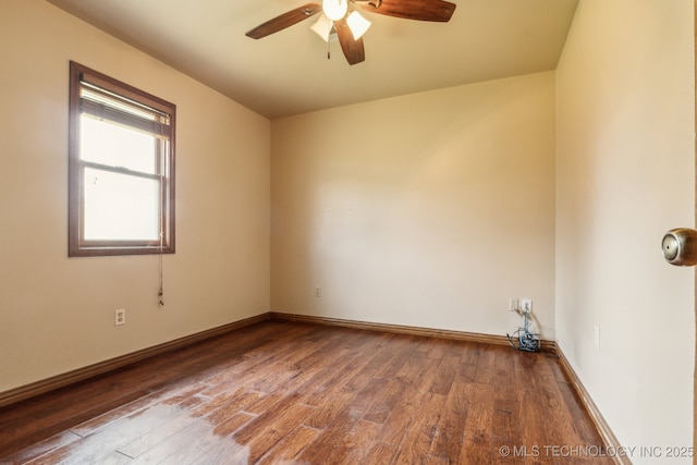 5601 S 9th E, Muskogee, OK 74403 - spare room featuring wood finished floors, ceiling fan, and baseboards