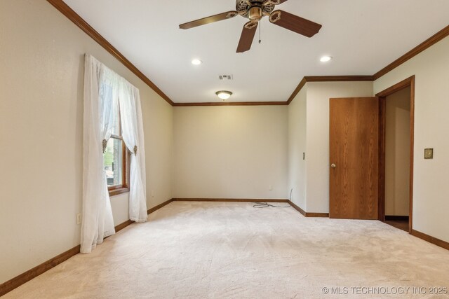 5601 S 9th E, Muskogee, OK 74403 - spare room with light colored carpet, visible vents, and crown molding