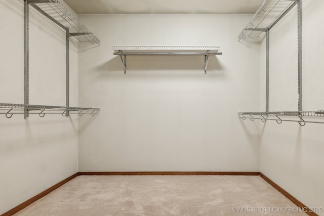 5601 S 9th E, Muskogee, OK 74403 - walk in closet with light carpet