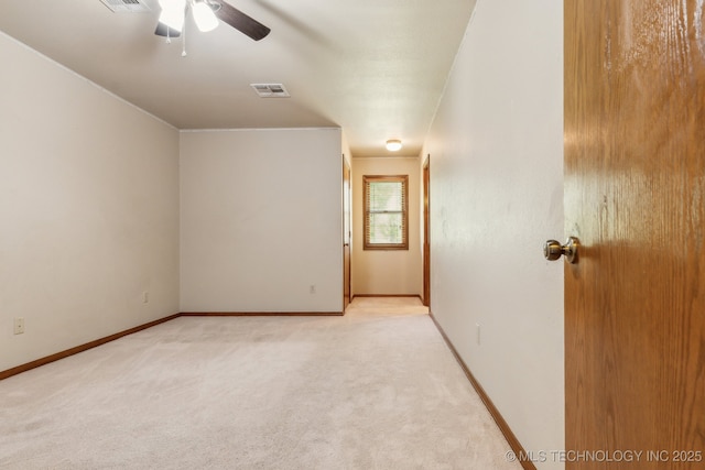 5601 S 9th E, Muskogee, OK 74403 - empty room with baseboards, visible vents, light carpet, and ceiling fan