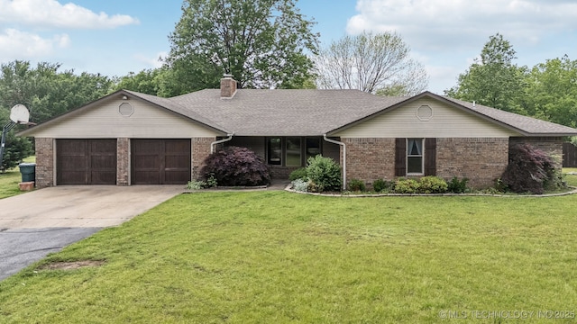 5601 S 9th E, Muskogee, OK 74403 - single story home featuring concrete driveway, a chimney, brick siding, a front lawn, and a garage