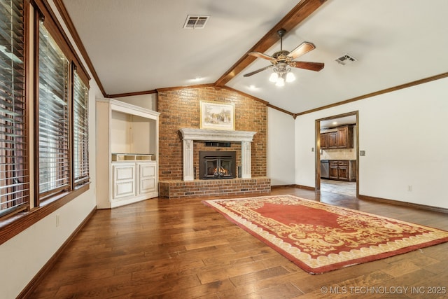 5601 S 9th E, Muskogee, OK 74403 - living room with wood-type flooring, crown molding, a ceiling fan, and visible vents