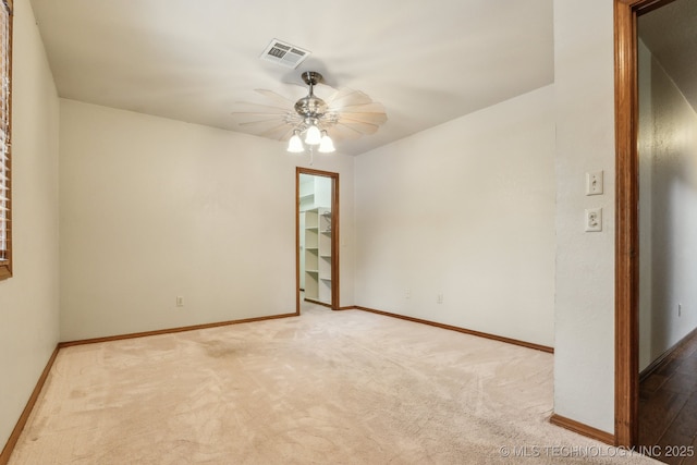 5601 S 9th E, Muskogee, OK 74403 - carpeted empty room with a ceiling fan, visible vents, and baseboards