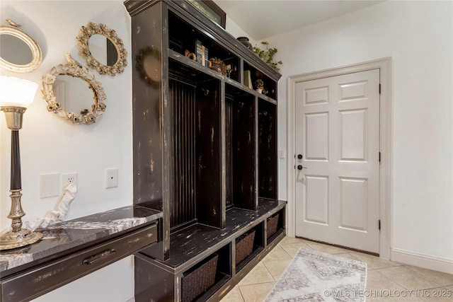 mudroom with light tile patterned floors