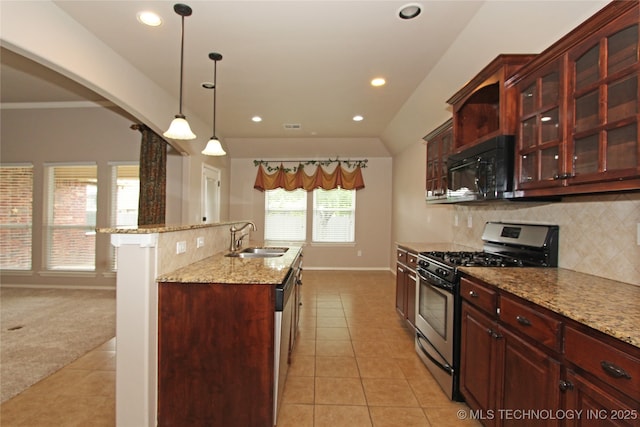 kitchen featuring tasteful backsplash, a sink, stainless steel appliances, baseboards, and light tile patterned flooring