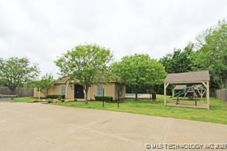 exterior space featuring a front yard