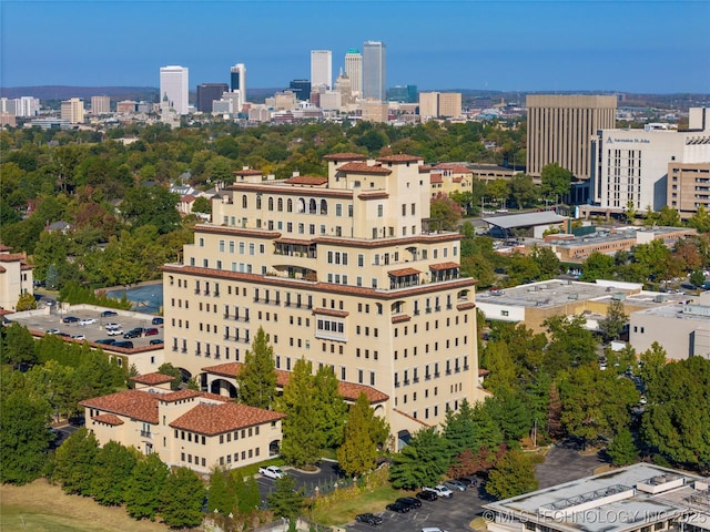 birds eye view of property with a view of city