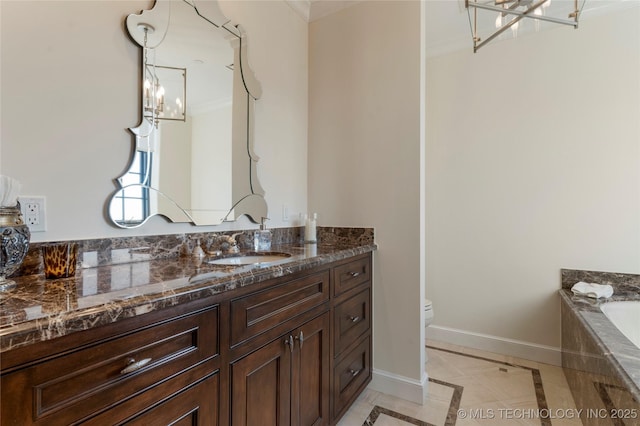 full bathroom with baseboards, ornamental molding, a tub, and an inviting chandelier