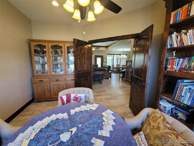 2267 Krebs Lk, Mcalester, OK 74501 - dining room with light wood-style floors, ceiling fan, and baseboards