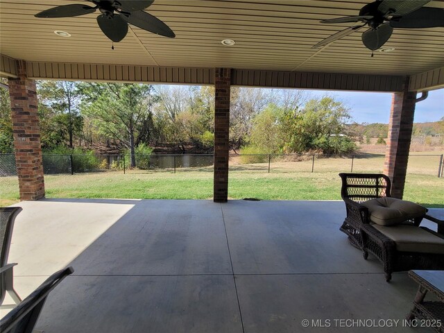 2267 Krebs Lk, Mcalester, OK 74501 - view of patio / terrace featuring ceiling fan and a water view