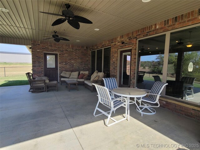 2267 Krebs Lk, Mcalester, OK 74501 - view of patio / terrace featuring a ceiling fan and an outdoor living space