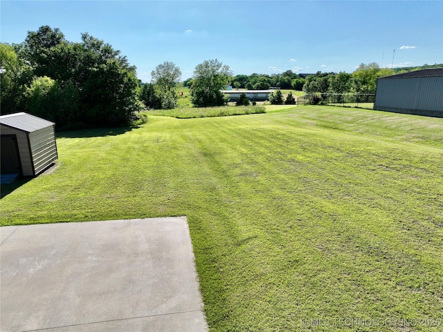 2267 Krebs Lk, Mcalester, OK 74501 - view of green lawn with an outbuilding