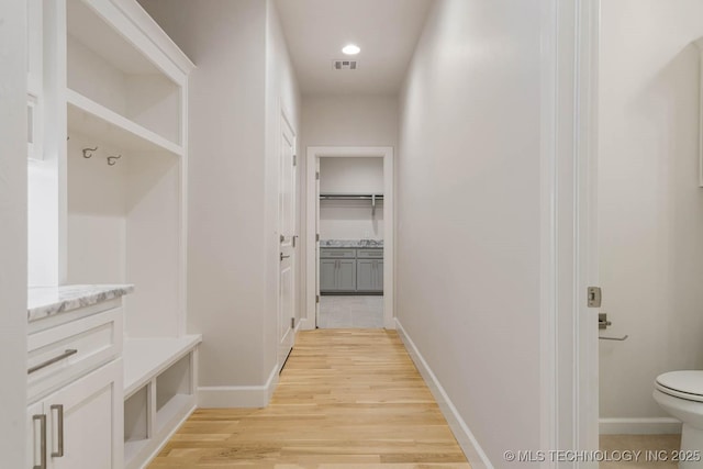 mudroom featuring recessed lighting, baseboards, visible vents, and light wood-type flooring