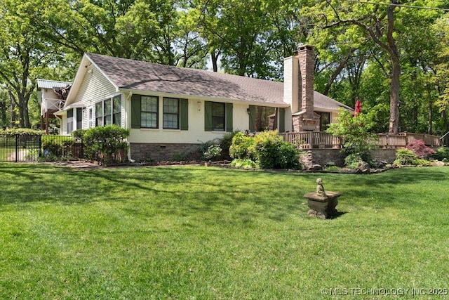 single story home with a chimney, roof with shingles, brick siding, fence, and a front lawn