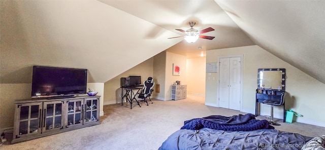 carpeted bedroom with baseboards, vaulted ceiling, and ceiling fan